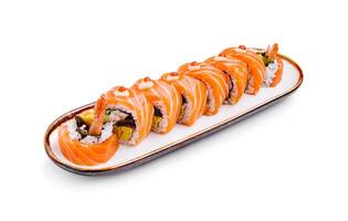 Colorful sushi platter featuring fresh salmon and shrimp on a rectangular dish photo