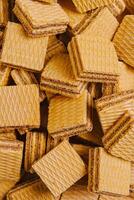 Crispy wafers stacked neatly, showcasing layers and textures in a delightful arrangement photo