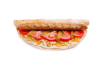 Delicious kebab wrap filled with fresh vegetables and savory ingredients served on a white background photo