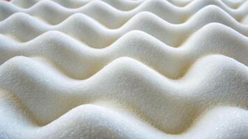 Wavy soft white foam material texture close-up abstract art serene environment smooth visual concept photo