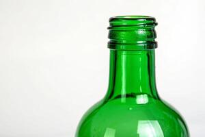 Close-up of a green bottle on a white background material focus studio environment artistic viewpoint photo