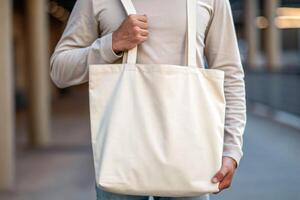 Soft close-up view of a person holding a soft tote bag urban environment lifestyle concept photo