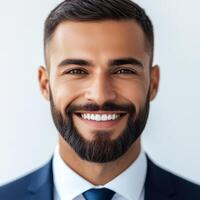 Young professional with a beard smiles confidently while dressed in a formal suit at a networking event photo