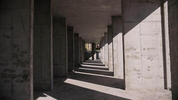 Concrete columns and shadows in building construction video