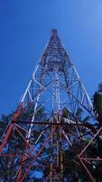 a tall tower with a blue sky in the background photo