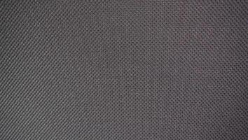 a close up of a black fabric background photo