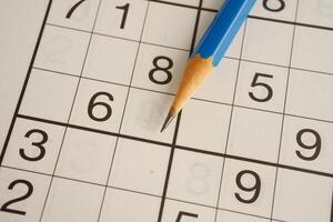 Sudoku puzzle, game to play for keep you brain younger for developing Alzheimer disease photo