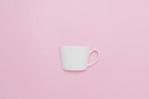 Creative minimalist composition of a white coffee cup set against a pink background, symbolizing love and warmth. photo