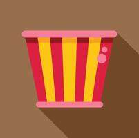 Red and yellow striped popcorn bucket with pink trim on brown background vector