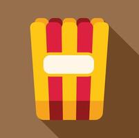 Striped popcorn bucket with blank label on brown background vector