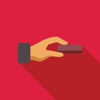 Hand holding small rectangular object on red background vector
