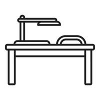 Manicure table with lamp and hand rest illuminating workspace for nail care vector