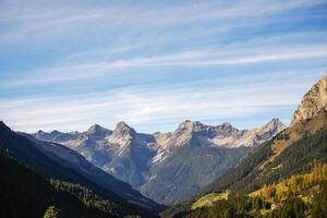 Fall scenery with moving clouds in the Austrian Alps, Tyrol photo