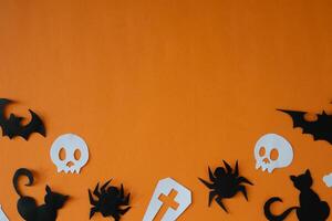 Graveyard and skull paper cut out for copy space background photo