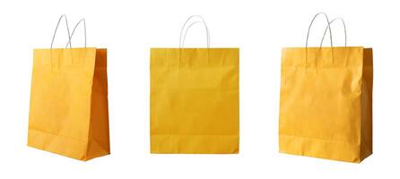 set of yellow shopping bags isolated photo