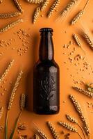 A glass beer bottle stands upright on a bed of malted barley. photo