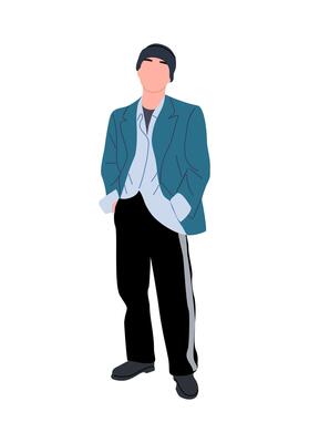 A man in a suit and tie standing with his hands in his pockets