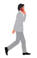 A man in a suit is walking and talking on a cell phone vector