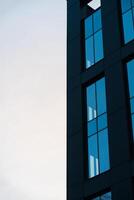 A tall building with a clock on it photo