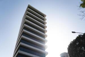 A tall building with a clock on it photo