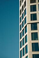 A tall building with a clock on it photo