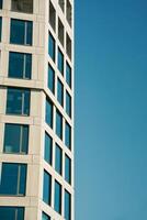 A tall building with a clock on it photo