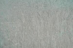 The pattern of surface wall concrete for background. Abstract of surface wall concrete for vintage background. Rust y damaged to surface wall. Wall texture for background. photo