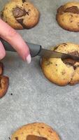 dark chocolate chip cookie dough making process Making and Mixing Chocolate Chip Cookies dough in a transparent glass bowl in 4K. Concept of Preparing Chocolate Chip cookies step by step. video