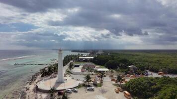 An aerial view of a lighthouse on a beach video