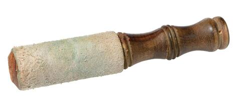 Wooden stick for Tibetan singing bowls for meditation, sound therapy and spiritual practices. Used to create resonant sounds when rubbed along the edge of the bowl photo