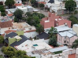 Panoramic view of the city from the tower of the Cardinales Cofico complex. View of the roofs of buildings. Cloudy photo