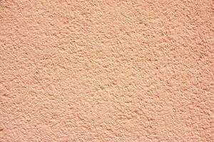 Beautiful vintage background. Abstract Grunge Decorative Stucco Wall Texture. Wall cement backgrounds and textures. Pink photo