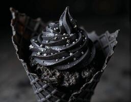 A chocolate cupcake with a frosting on top photo