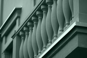 a close up of a balcony railing photo