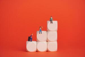 Income job hierarchy represented with colorful blocks and figures photo
