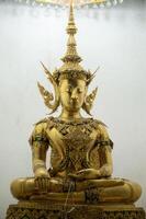 The mock-up of Phra Fang Buddha statue in Wat Phra Fang temple in Uttaradit province of Thailand. The real statue is currently preserved at Wat Benchamabophit, Bangkok. photo