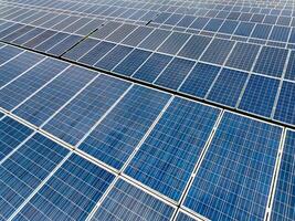 Aerial view of solar farm. Sustainable renewable energy and modern photovoltaic technology for eco-friendly electricity production. Solar power station. Green energy solutions. Solar panel photo