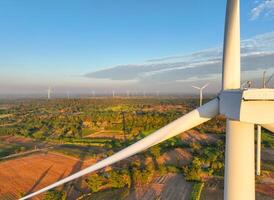 Wind energy and sustainable power generation with wind turbines, Eco-friendly solutions for renewable resources. Wind power farm and sustainable development of renewable energy photo
