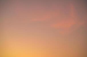 Orange sunset sky creating a serene and tranquil atmosphere, ideal for climate and environmental concepts or as emotional and psychological design background, evoking warmth and creativity. photo