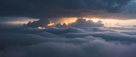 Dramatic Cloudscape with Golden Glow and Dark Shadows. photo