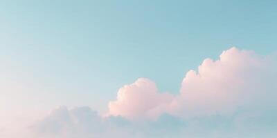 Whimsical pastel sky featuring soft blue and pink clouds with ample space for text in the upper half and light gradient background. photo