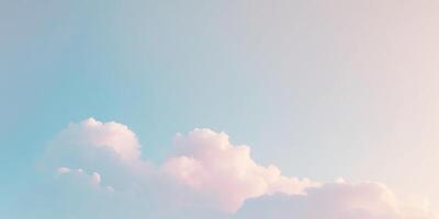Whimsical pastel sky featuring soft blue and pink clouds with ample space for text in the upper half and light gradient background photo