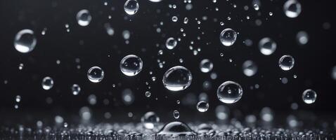 close up of water drops on black background. photo