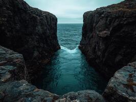 Ocean inlet between dramatic cliffs photo