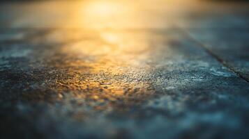 A blurry image of a wet surface with a sun shining on it photo