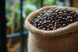 Burlap sack overflowing with fresh coffee beans photo