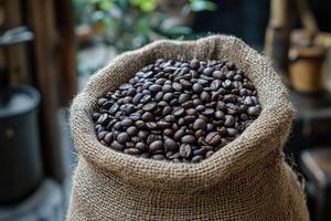 Burlap sack overflowing with fresh coffee beans. photo