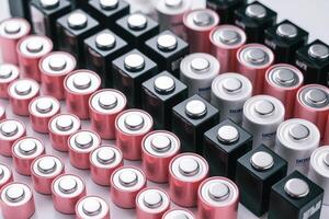 Rows of colorful batteries create a striking visual of power and energy storage photo