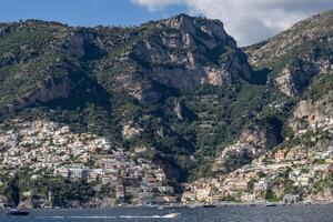 Positano village and cliff rock along the Amalfi coast. photo