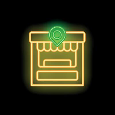 Neon sign showing location of street food stall or shop on black background